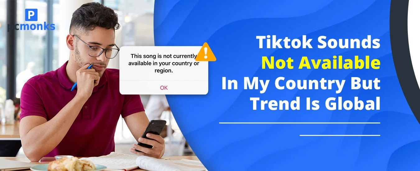 Man frustrated with TikTok "Sound not available in your country" error message on a smartphone.
